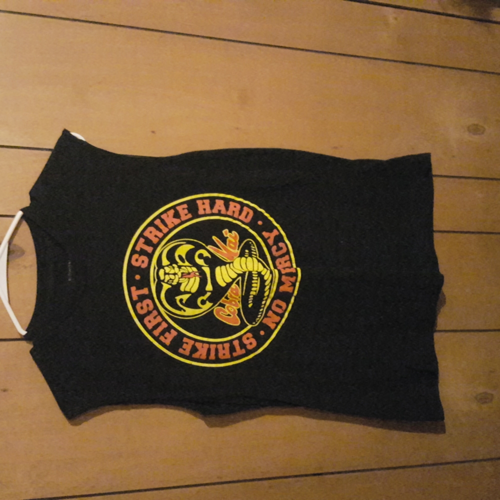 Cobra Kai T-shirt with sleeves cut out of it